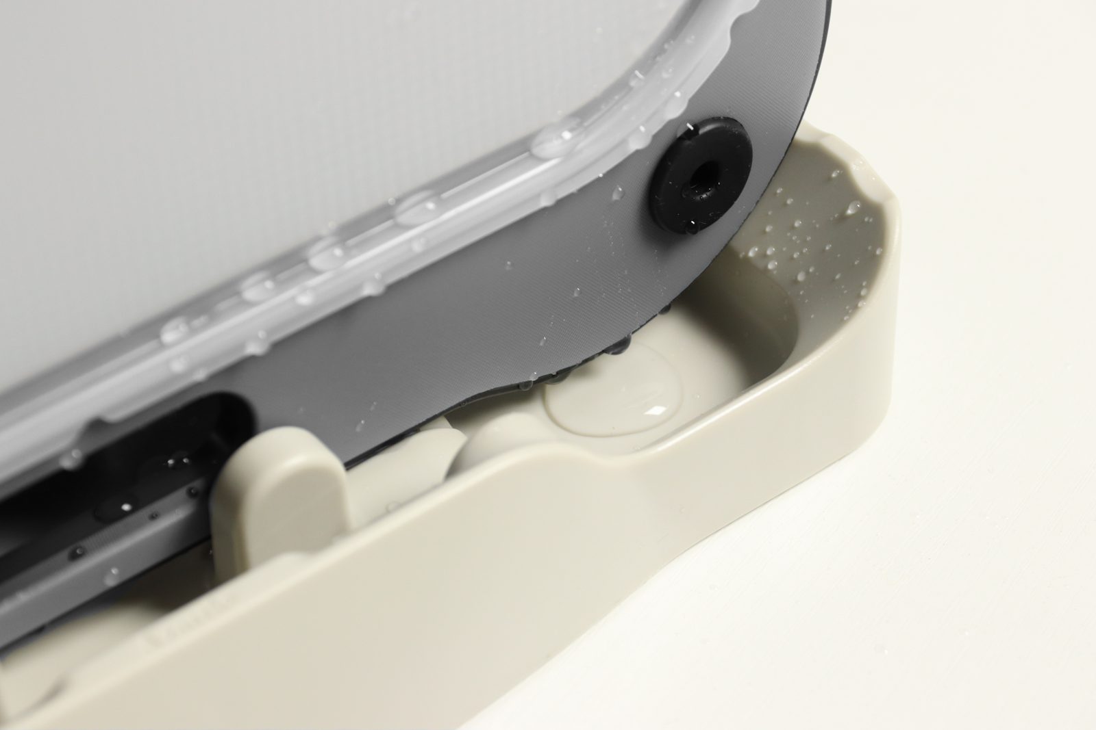 Water dripping from the CleanFlip board into the stand tray